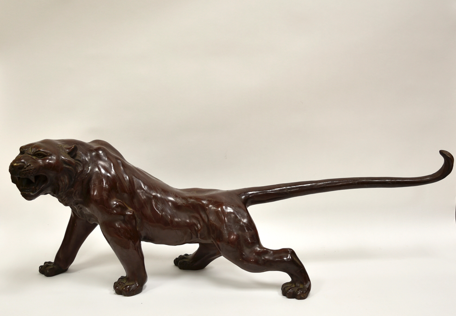 Appraisal: A JAPANESE BRONZE TIGER MEIJI PERIOD Japanese Meiji Period heavily