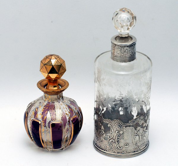 Appraisal: Two glass perfumes Clear glass etched with flowers having silver