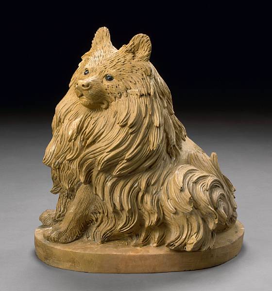 Appraisal: A marble figure of a Pomeranian Seated demurely on an