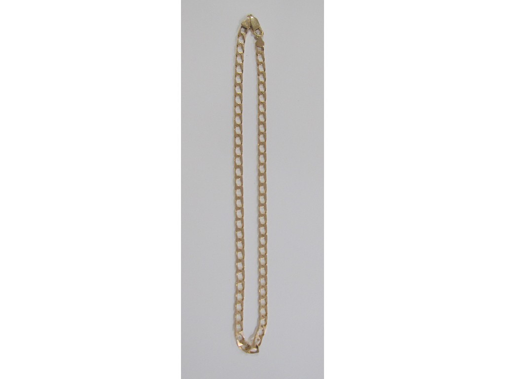 Appraisal: Nine carat gold flat curb link neckchain Approximated gms