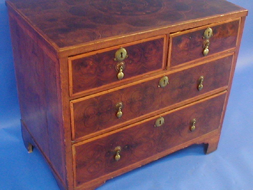 Appraisal: A Queen Anne oyster veneered chest of two short and