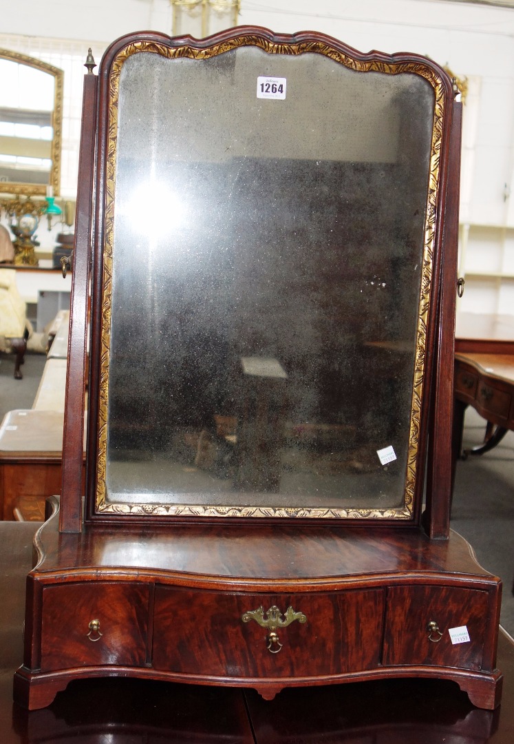 Appraisal: A George III parcel gilt mahogany toilet mirror with serpentine