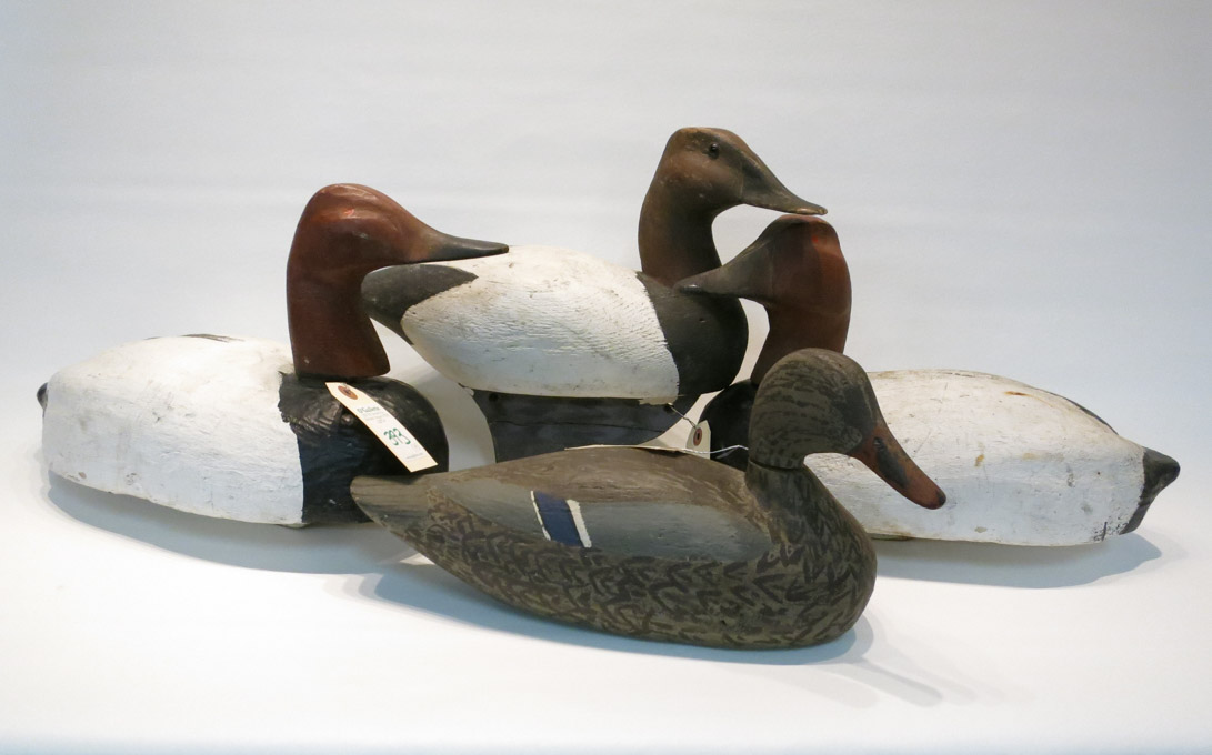 Appraisal: FOUR COLLECTIBLE DUCK DECOYS The first stamped Saylor with weighted