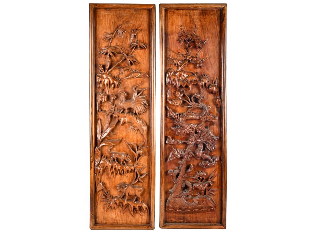 Appraisal: PAIR OF CARVED WOOD PANELSframed x inches Condition