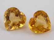 Appraisal: Two loose polished heart shaped citrines approx carats