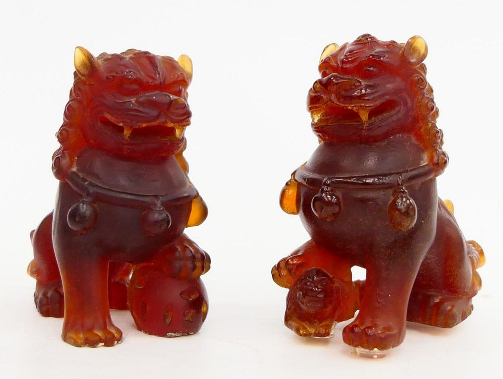 Appraisal: PAIR OF DAUM PATE DE VERRE FOO LION FIGURES PAIR