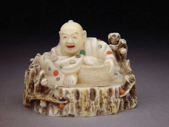 Appraisal: ANTIQUE INLAID IVORY NETSUKE Antique Shibayama-style carved ivory netsuke of