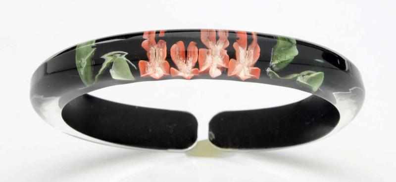 Appraisal: Clear Bakelite Bracelet with Floral inserts Jewelry Condition Excellent Size