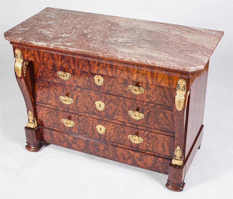 Appraisal: LATE EMPIRE ORMOLU-MOUNTED MAHOGANY COMMODE The rectangular marble top with