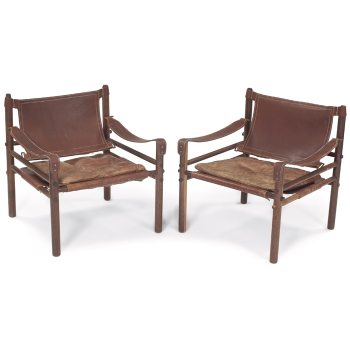 Appraisal: Arne Norell ''Sirocco Safari'' lounge chairs pair Sweden c jacaranda