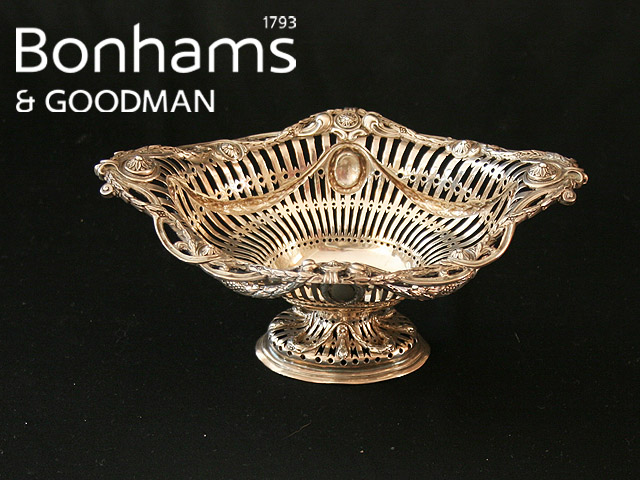 Appraisal: An early Victorian Sterling silver twin handled footed sweetmeat basket