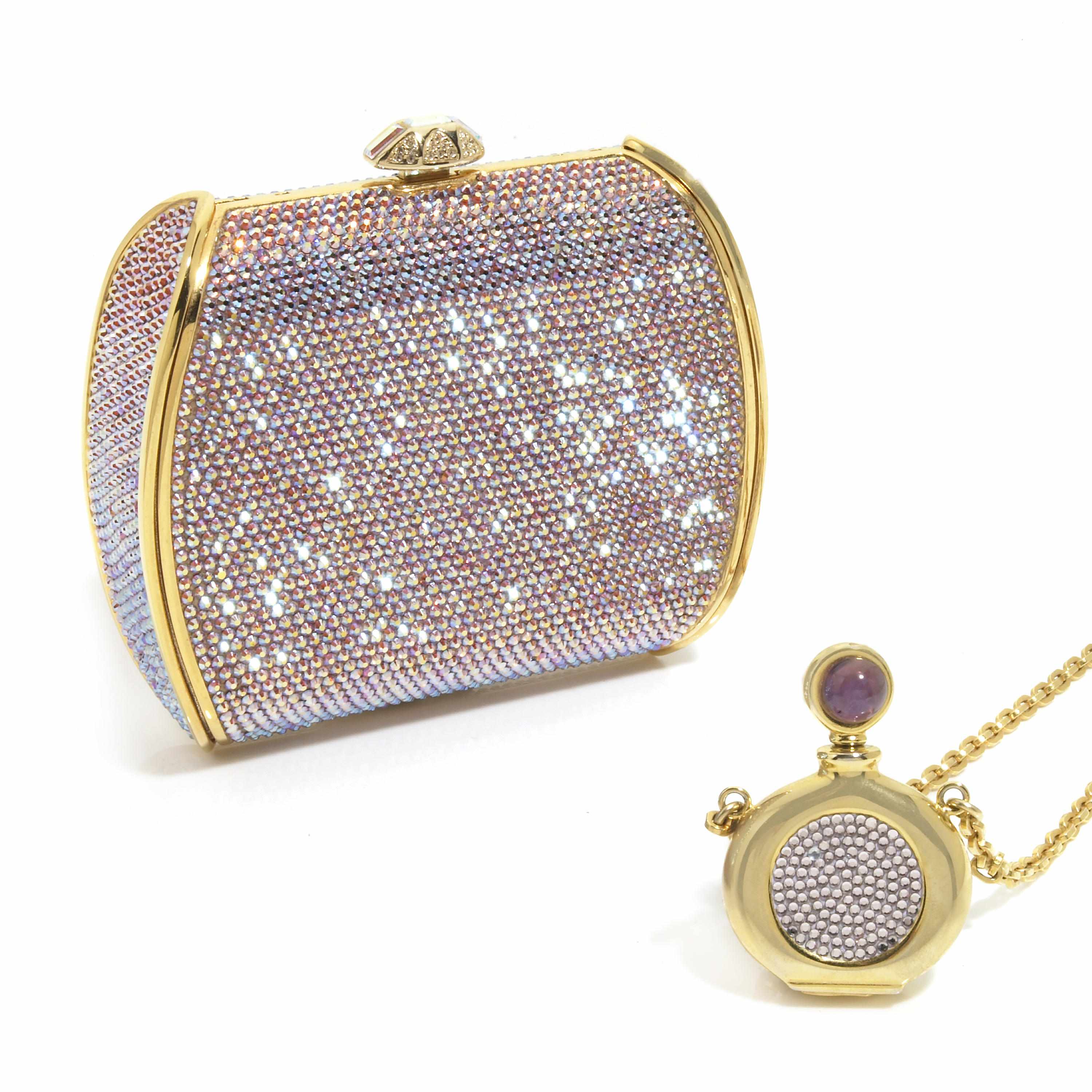 Appraisal: A pink-purple crystal purse with gold colored metal detailing together