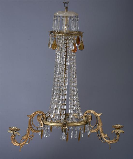 Appraisal: EMPIRE GILT METAL AND CRYSTAL THREE-LIGHT CHANDELIER th century with