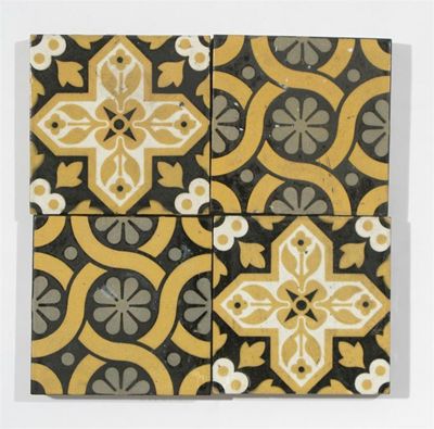 Appraisal: A collection of W Godwin encaustic tiles decorated with stylised