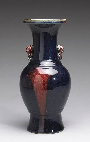 Appraisal: A flamb red and blue glazed porcelain vase th Century