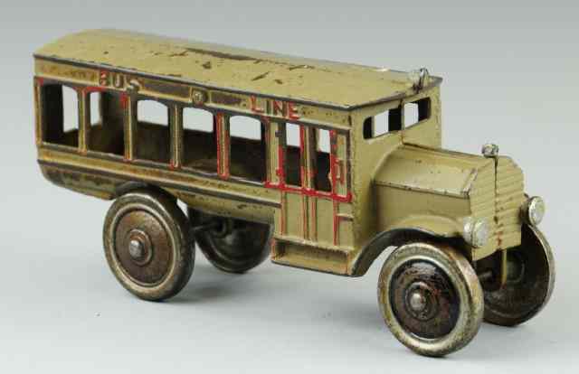 Appraisal: SCHOOL BUS Dent cast iron school bus painted in tan