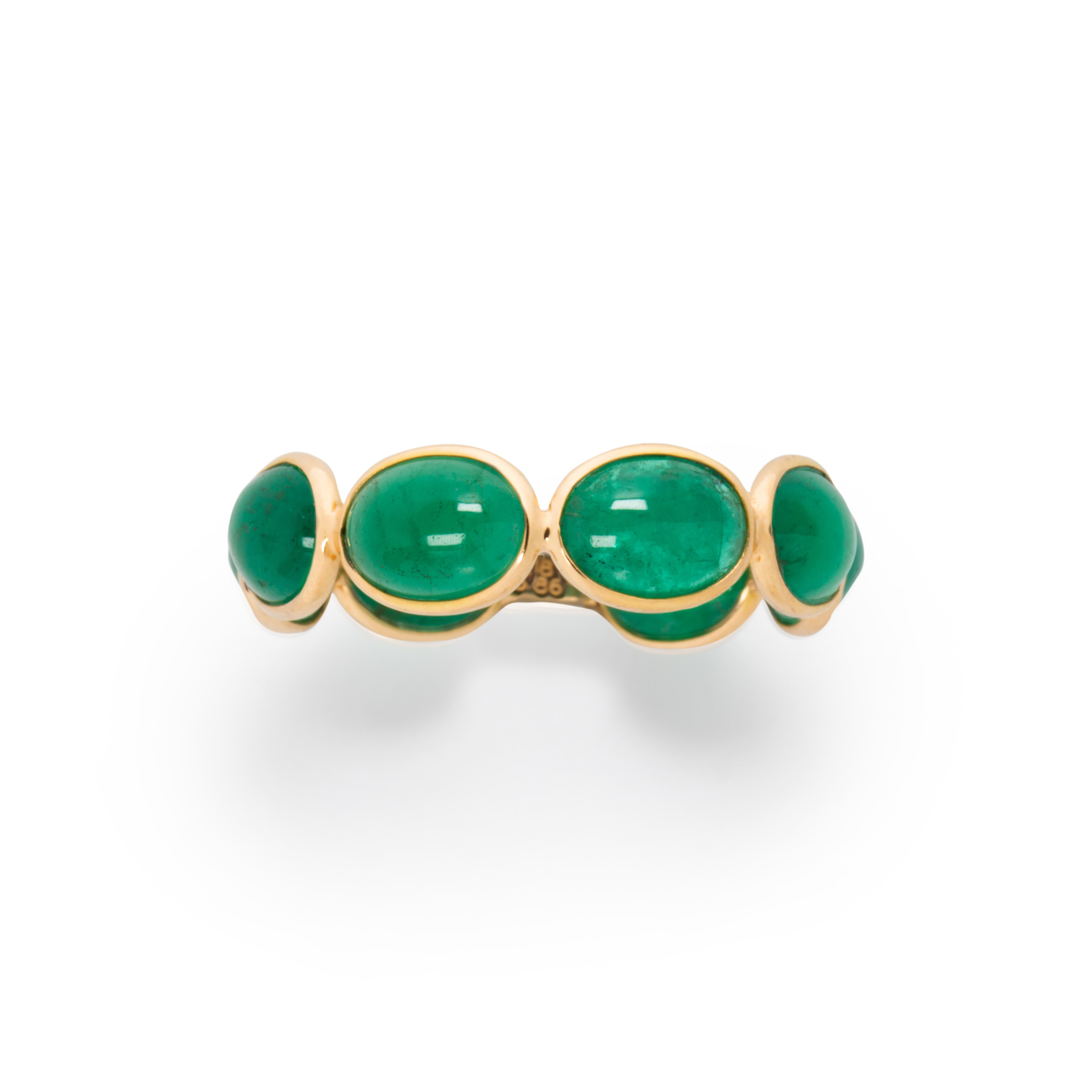 Appraisal: AN EMERALD AND EIGHTEEN KARAT GOLD RING An emerald and