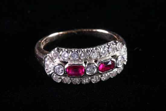 Appraisal: K YELLOW AND WHITE GOLD DIAMOND AND RUBY RING Arched