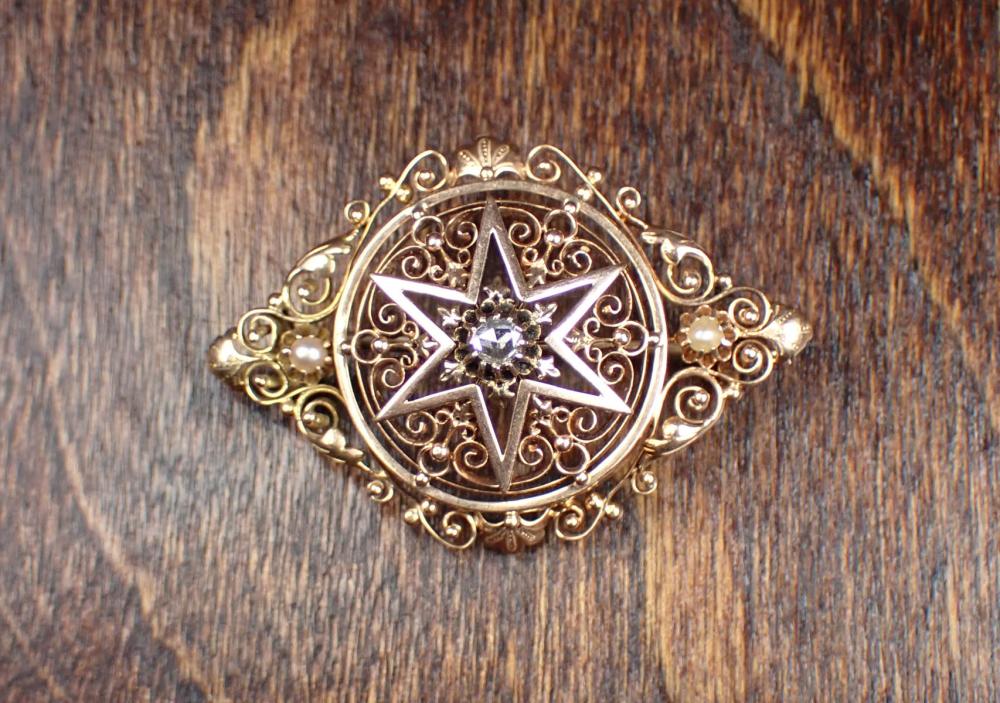 Appraisal: VICTORIAN DIAMOND AND FOURTEEN KARAT GOLD BROOCH The k yellow