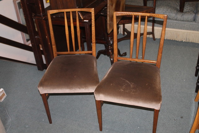 Appraisal: A SET OF FOUR GORDON RUSSELL WALNUT SIMILAR DINING CHAIRS