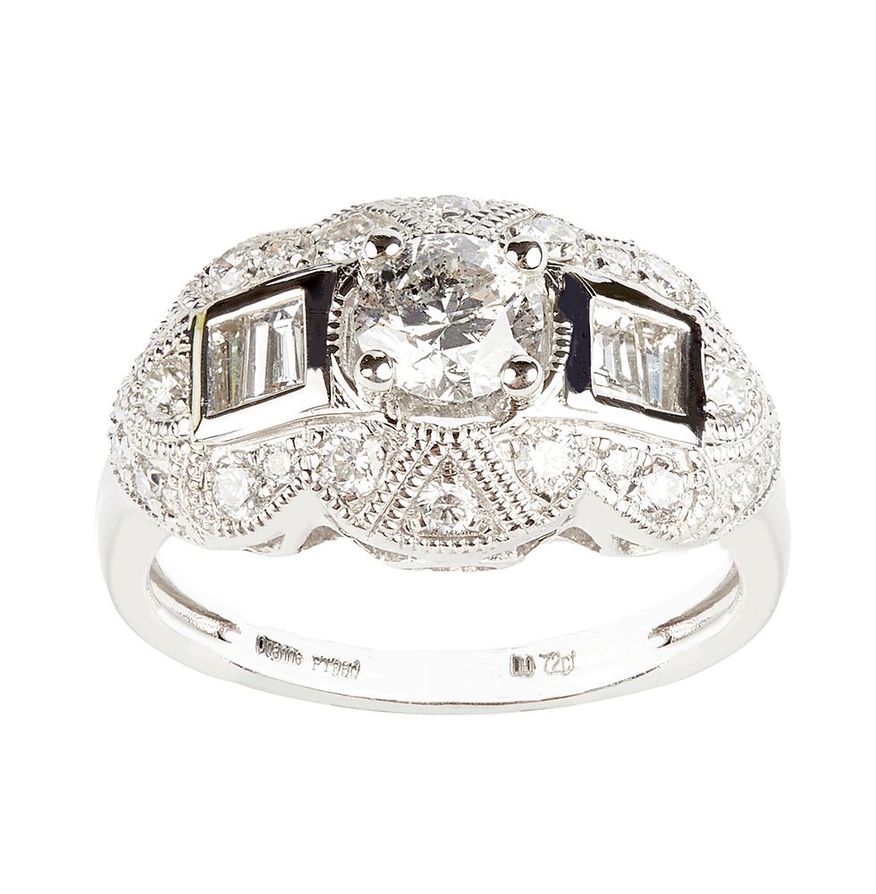 Appraisal: Diamond and Platinum Unity Ring Diamond and platinum unity ring