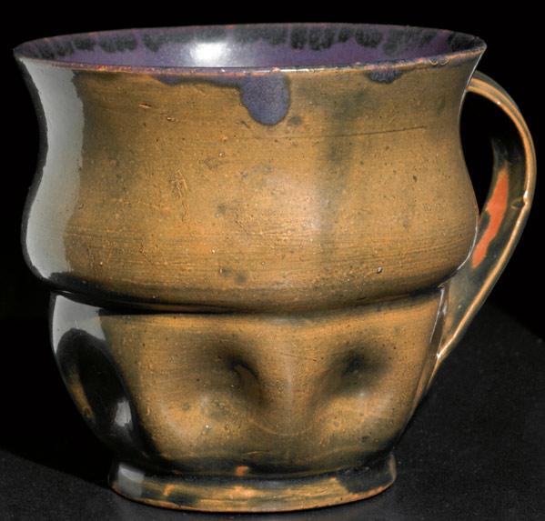 Appraisal: GEORGE OHR Mug with dimpled base the exterior in olive