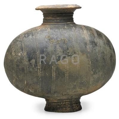 Appraisal: CHINESE GREY COCOON JAR Horizontal banded design flared lip Han