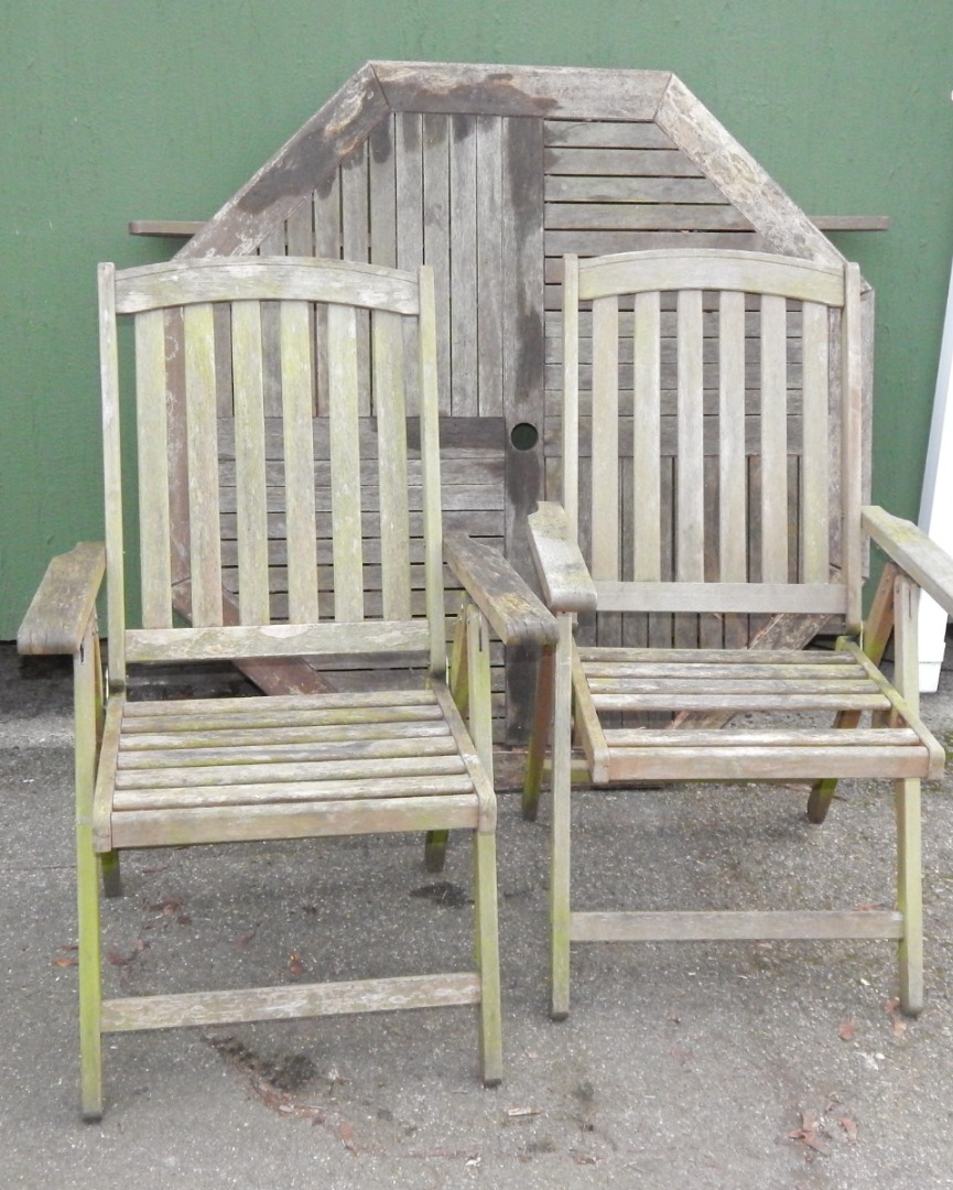 Appraisal: A pair of hardwood folding garden chairs and an octagonal