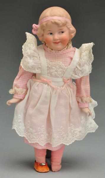 Appraisal: Sassy Heubach Character Girl Doll Description German bisque shoulder head