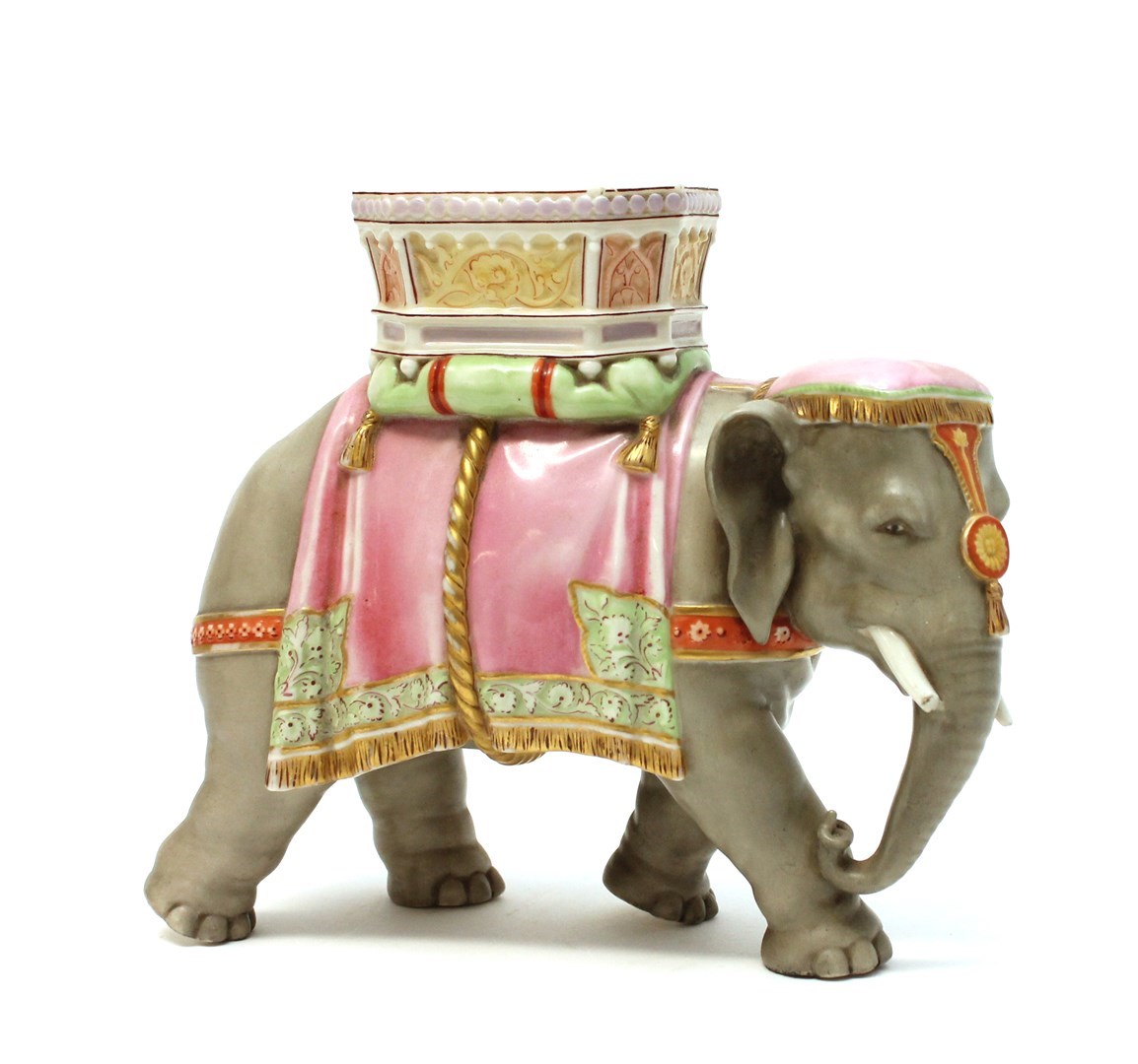 Appraisal: A Royal Worcester porcelain elephant vase circa modelled with howdah