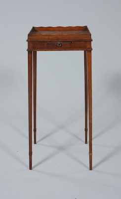 Appraisal: A Mahogany Teakettle Stand In the George III style with