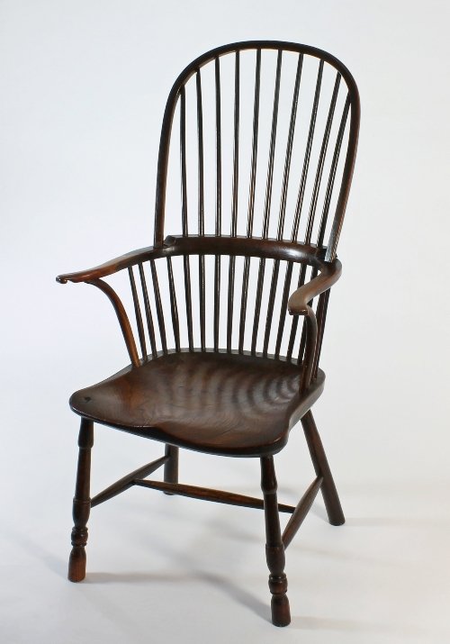 Appraisal: A beech and elm high back Windsor armchair with comb