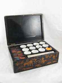 Appraisal: A late Victorian large gilt black lacquer watercolour paintbox with