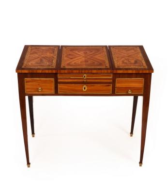 Appraisal: A lady's French late th Century enclosed rosewood dressing table