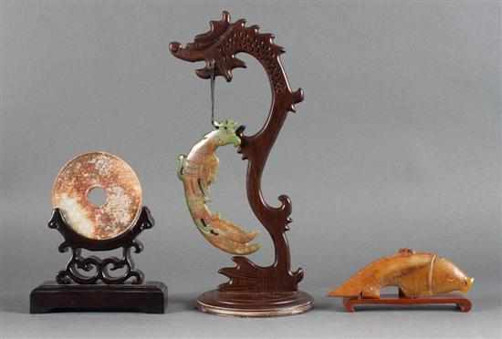 Appraisal: Chinese carved jade pi phoenix and fish pi - with