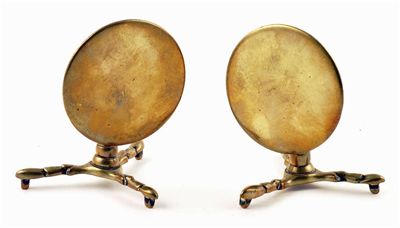 Appraisal: A pair of th century brass candle reflectors modelled as