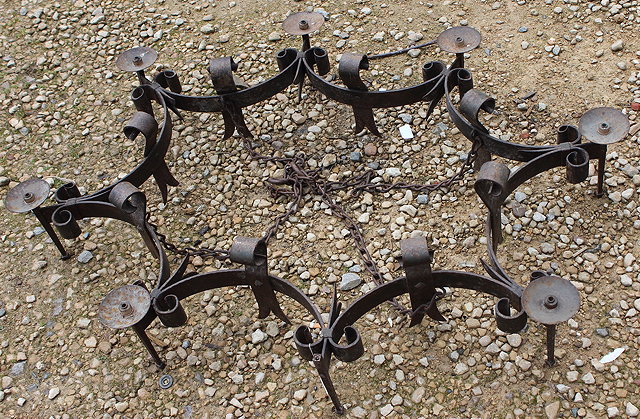 Appraisal: A LARGE WROUGHT IRON EIGHT BRANCH CHANDELIER with scrolling mount