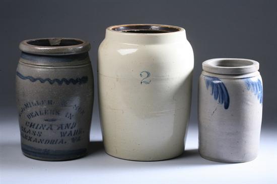 Appraisal: THREE AMERICAN STONEWARE CROCKS One blue stencilled E J Miller