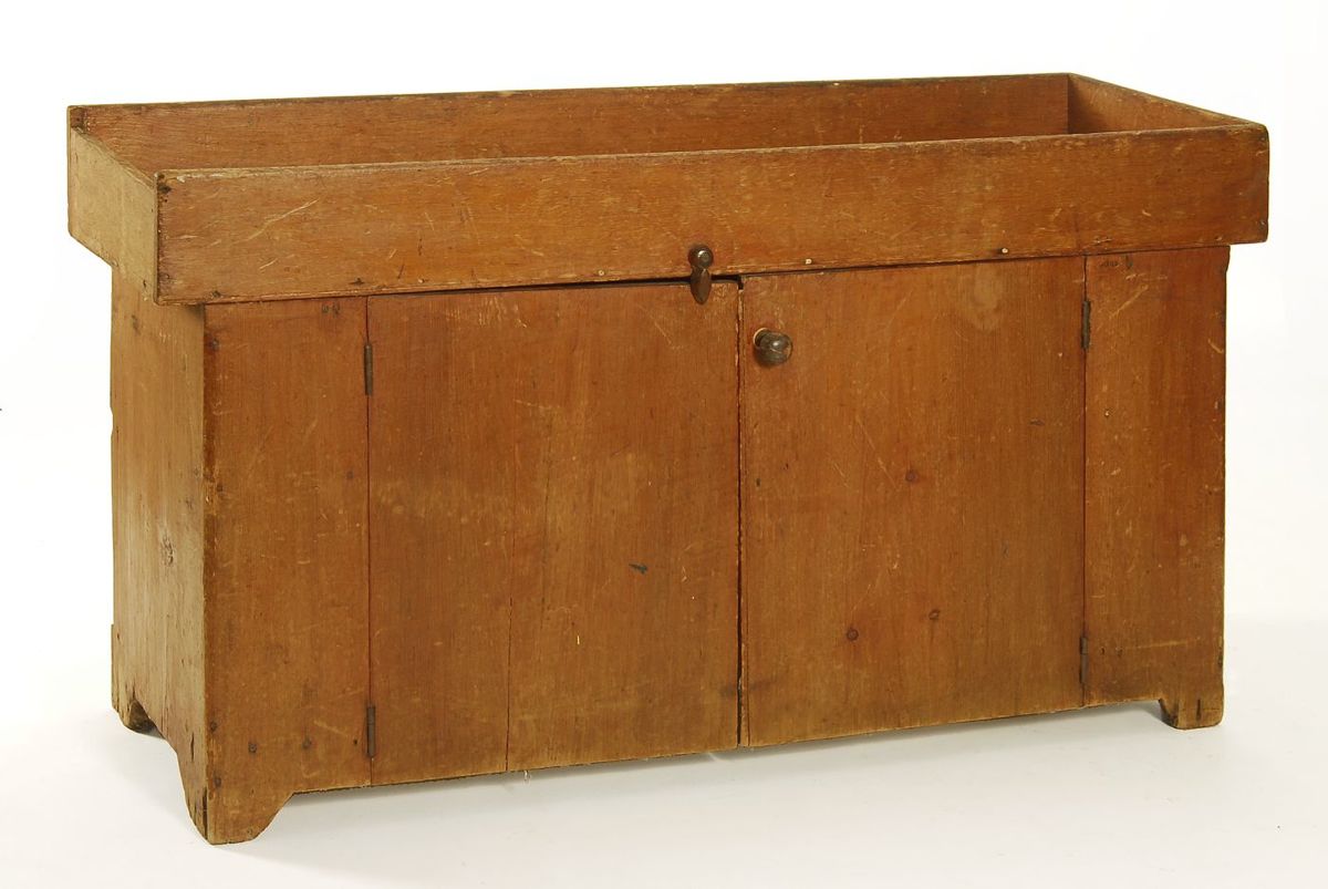 Appraisal: ANTIQUE AMERICAN TWO-DRAWER DRY SINK In pine with two doors