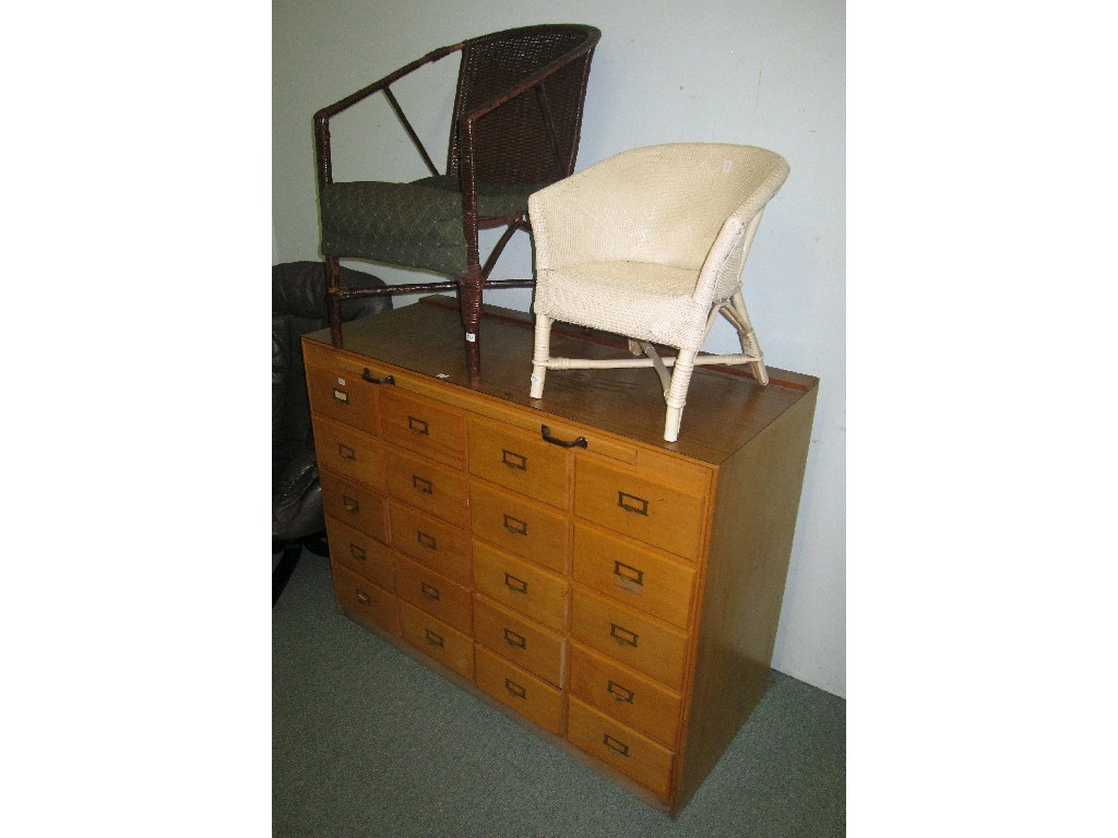 Appraisal: Lot comprising filing chest and two wicker chairs