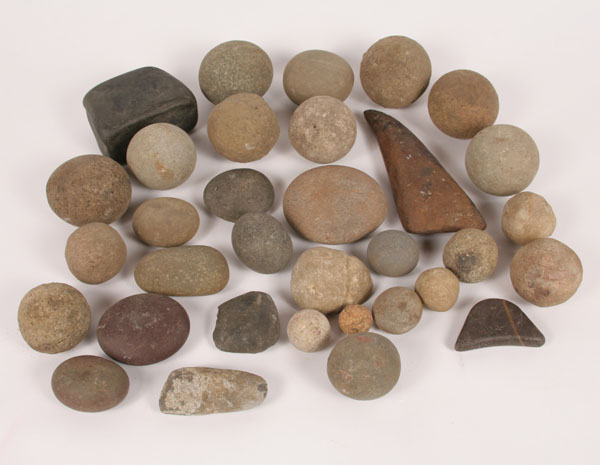 Appraisal: Game balls and miscellaneous stones numerous pieces Largest piece