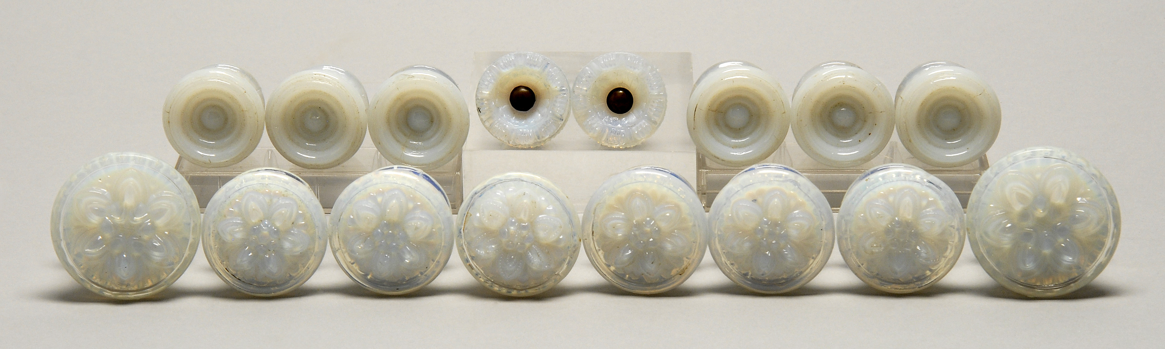 Appraisal: SIXTEEN SANDWICH GLASS DRAWER PULLS Second Half of the th