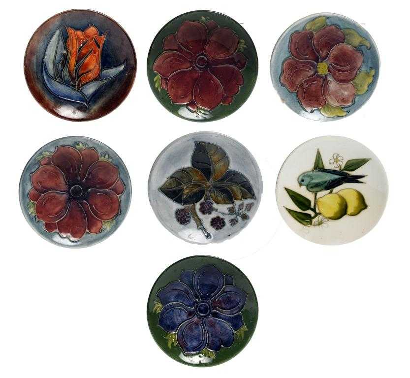 Appraisal: SEVEN MOORCROFT DISHES DESIGNED BY WALTER MOORCROFT AND OTHERS including