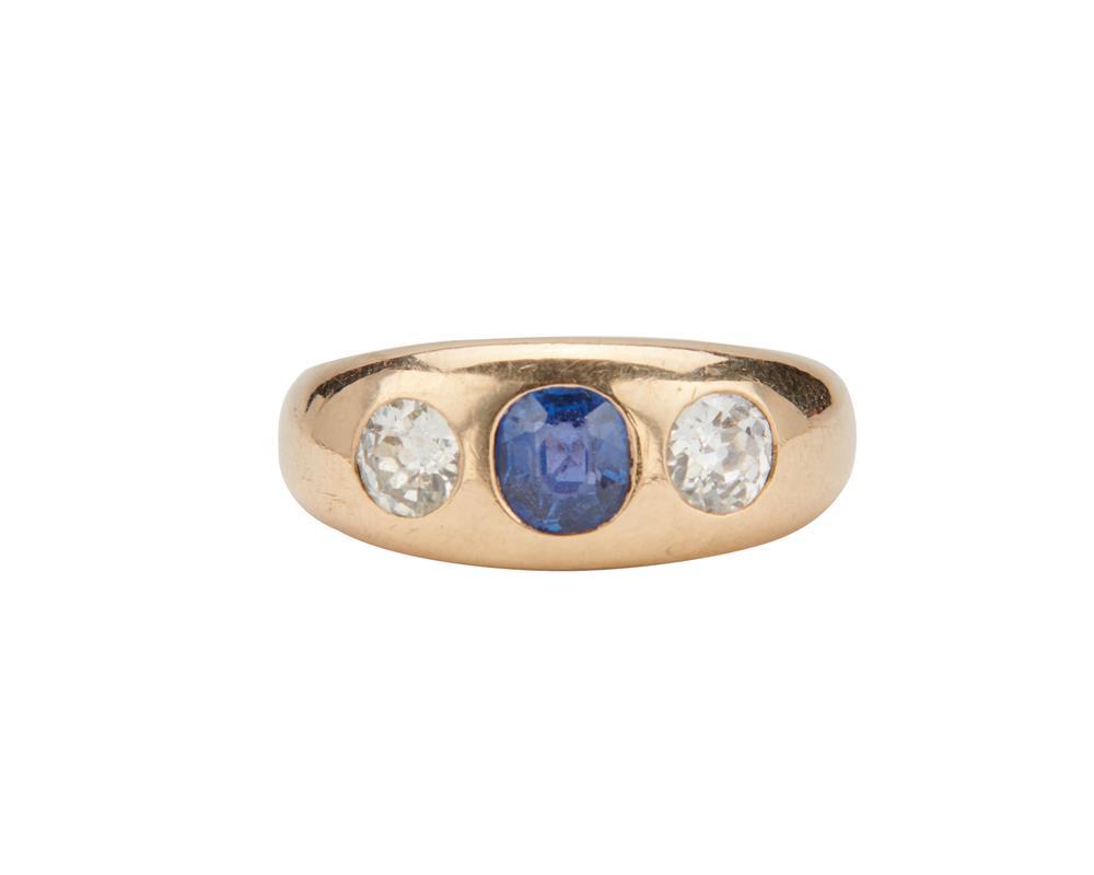 Appraisal: K Gold Sapphire and Diamond Ring centering an oval-cut sapphire