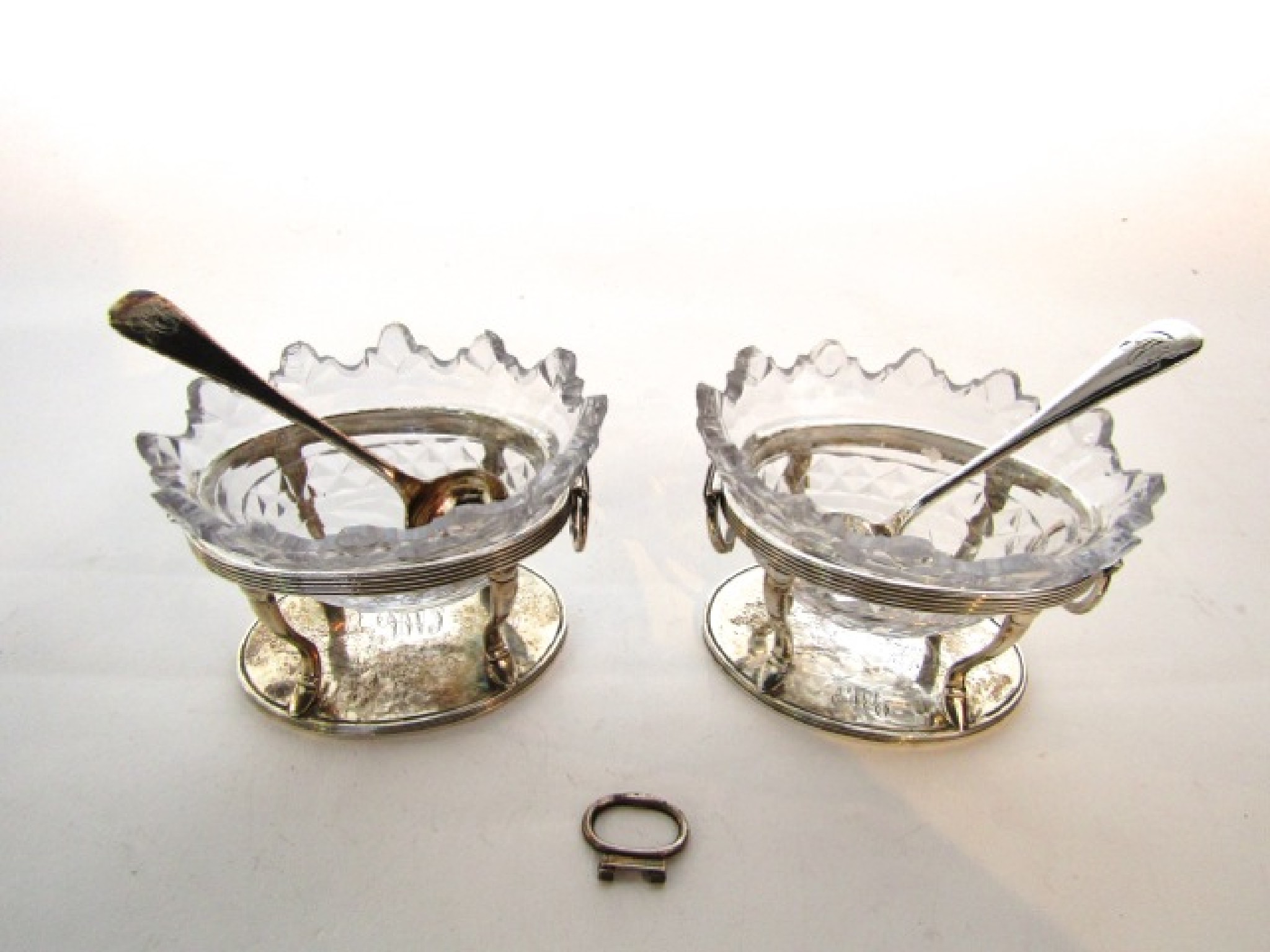 Appraisal: A pair of George III silver salt cellars Charles Chesterman