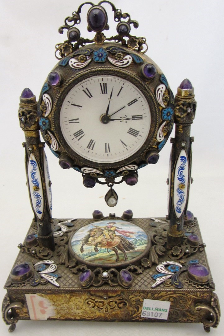 Appraisal: An enameled cabochon amethyst and cultured pearl mounted clock the