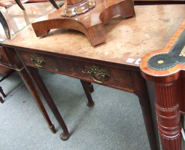 Appraisal: A George II mahogany side table with rectangular top a