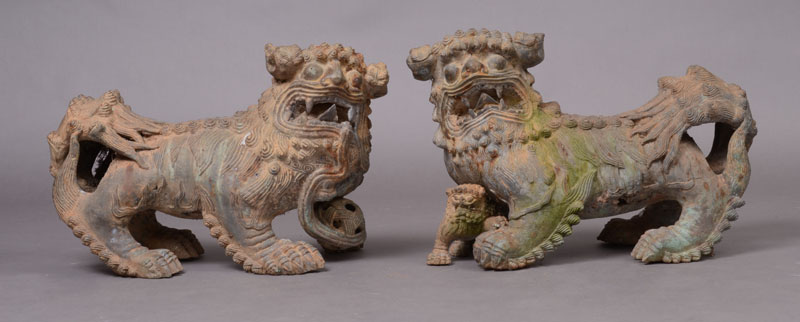 Appraisal: PAIR OF CHINESE PATINATED BRONZE TEMPLE DOGS One with a