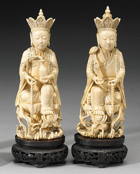 Appraisal: Two ivory figure of seated Guanyin th Century Each identically