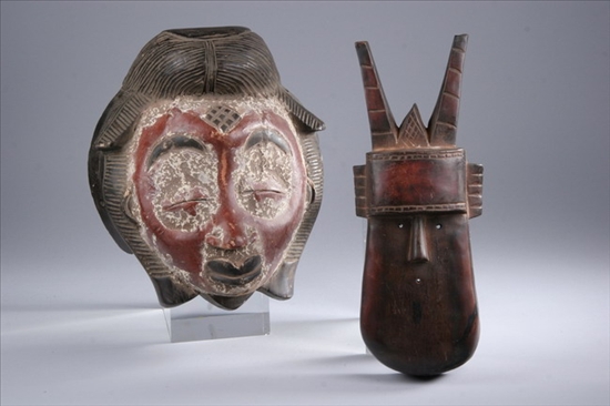 Appraisal: TOMA WOOD MASK AND PUNU PAINTED WOOD MASK th Century